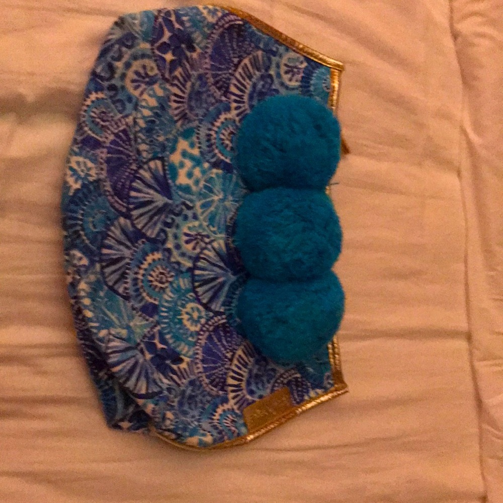Lilly Pulitzer blue and white seashell print zipper bag.